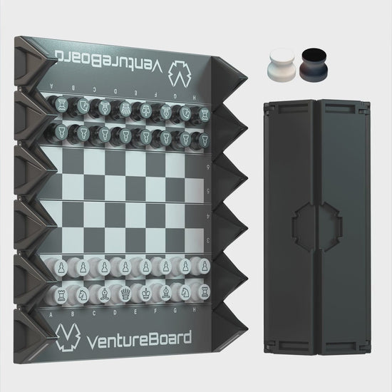A Mini Chess Noir magnetic travel chess set on a studio surface