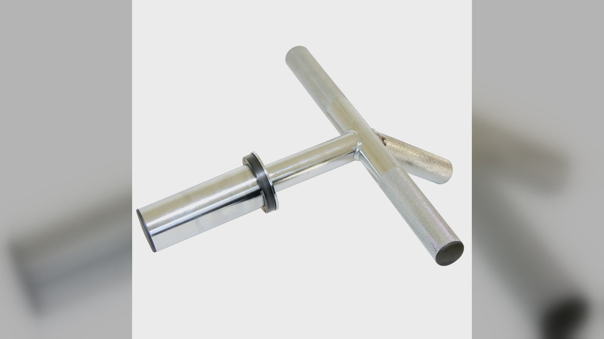 A chrome forearm and wrist bar clamped on a rack, shown in use