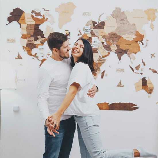 Multicolor 3D wooden world map shown on living room walls