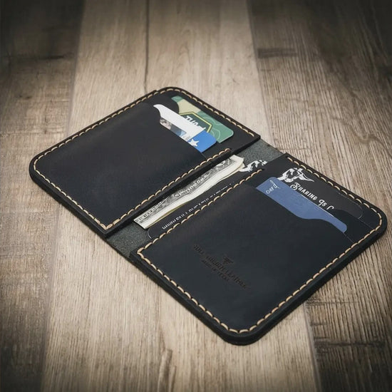 Bull Sheath Tyler vertical leather wallet in black