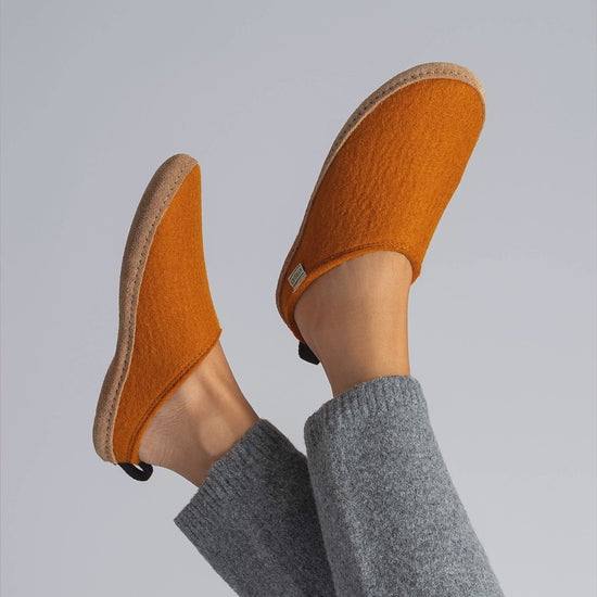 Kyrgies wool slides worn indoors and close-ups in Orange, Magenta, Pine Green and Oatmeal