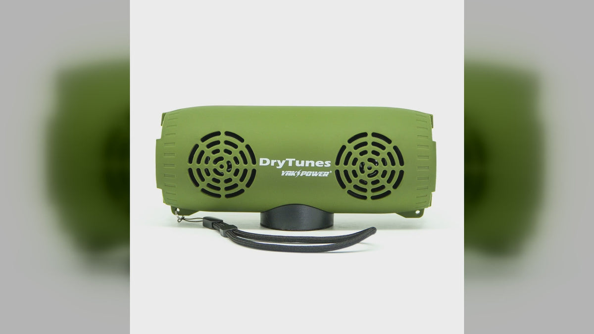 A Yak Power DryTunes floating Bluetooth speaker in olive and red