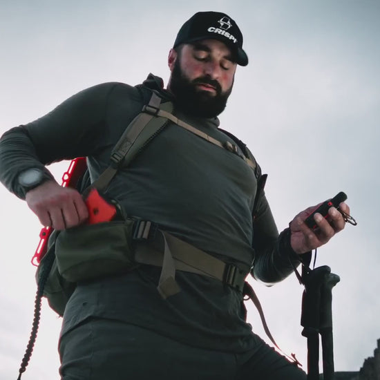 A Dark Energy Poseidon Pro power bank charging a phone outdoors