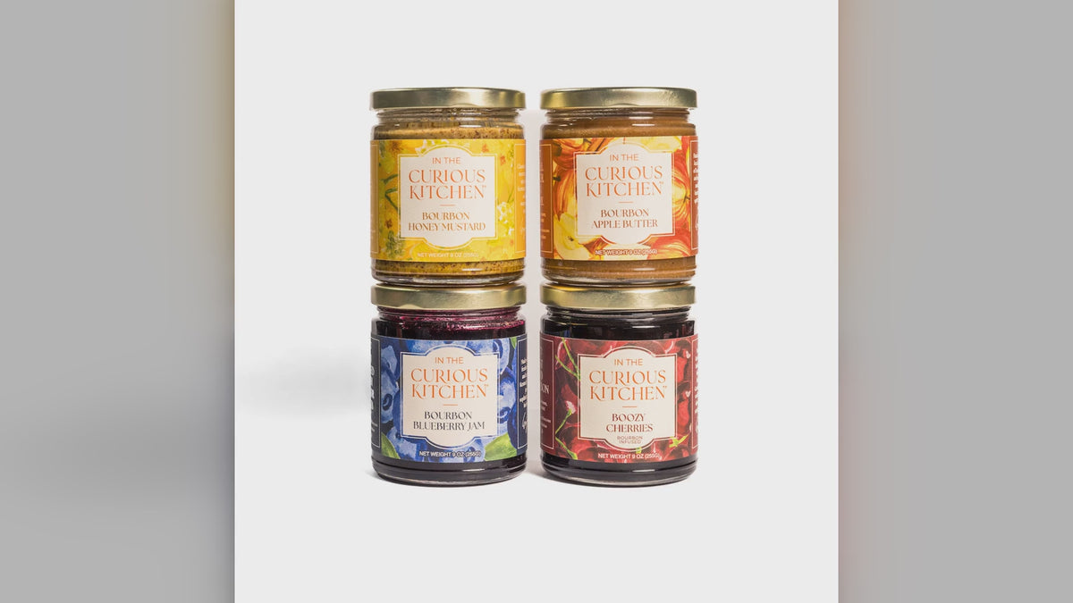 Four jars from the Bourbon Gift Set with serving shots